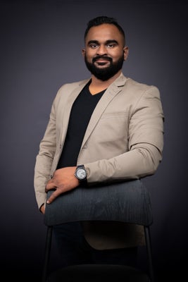 Portrait of Binup Gangadharan, Associate.